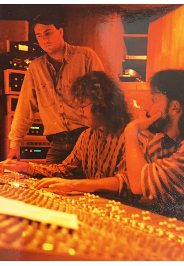 Sound engineers in recording studio